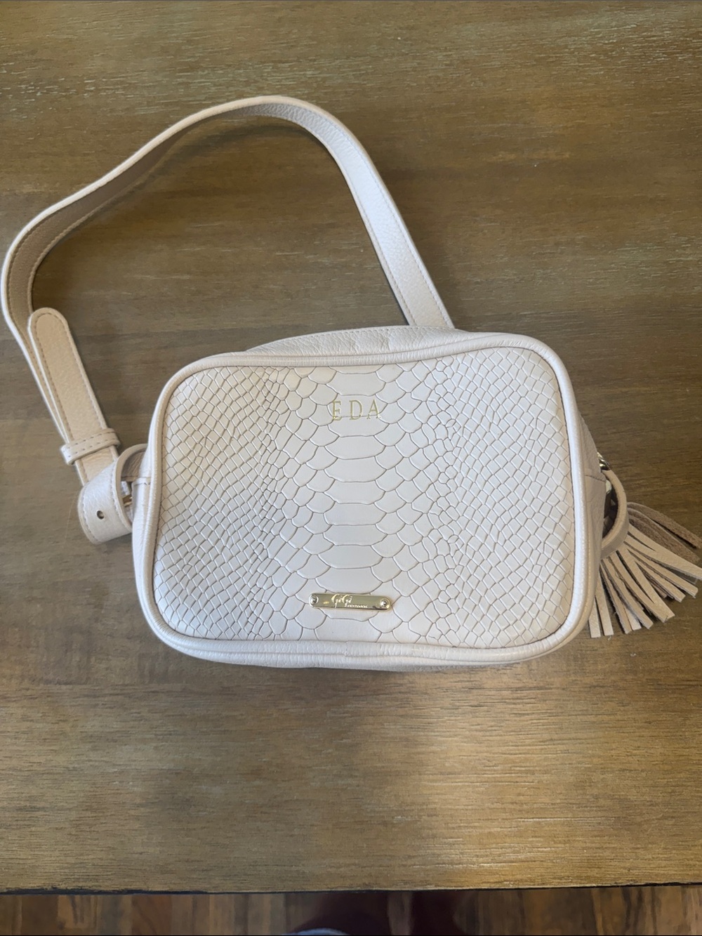 Cream snakeskin belt bag style Gigi New York
